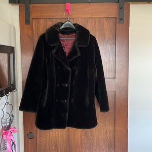 Fur coat.